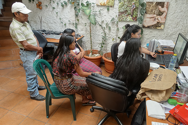 Qeqchi kaqchiquel Mayan interns learn how to draw Maya comic book characters 3498